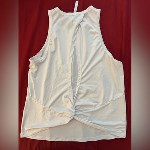 Back view of a Fabletics white tank top.